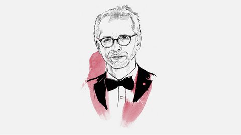 "Porträt-Illustration eines Mannes mittleren Alters mit grauem Haar und Brille in Schwarz-Weiß-Zeichnung. Er trägt Smoking mit schwarzem Sakko, weißem Hemd und schwarzer Fliege. Die Schultern und der Oberkörper sind mit rosa-roten Aquarell-Akzenten gestaltet. Sein Blick ist direkt nach vorne gerichtet."