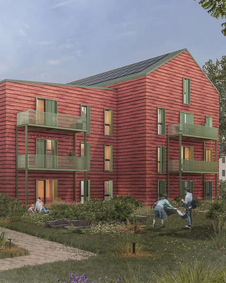 Visualisierung eines Wohnquartiers mit roten Holzgebäuden, Balkonen und begrünten Freiräumen.