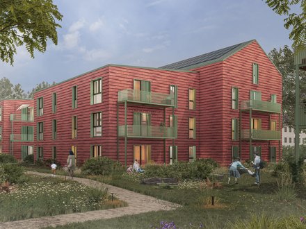 Visualisierung eines Wohnquartiers mit roten Holzgebäuden, Balkonen und begrünten Freiräumen.