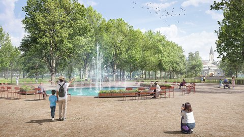 Ein heller Park mit vielen grünen Bäumen und einem runden Springbrunnen in der Mitte. Menschen sitzen auf Stühlen oder spazieren um das Wasser herum. Im Vordergrund zeigt ein Erwachsener einem Kind den Brunnen, während eine Person daneben ein Foto macht. Im Hintergrund fliegen Vögel am Himmel, und Gebäude sind teilweise sichtbar.