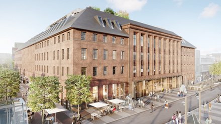 Historisches Backsteingebäude mit Erdgeschossnutzung und Menschen im öffentlichen Raum.