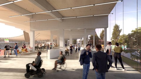 Architekturentwurf: Heller, barrierefreier Innenbereich des Stadions mit Betonpfeilern, großer Glasfront und vielen Besuchern, darunter mehrere Rollstuhlfahrer.